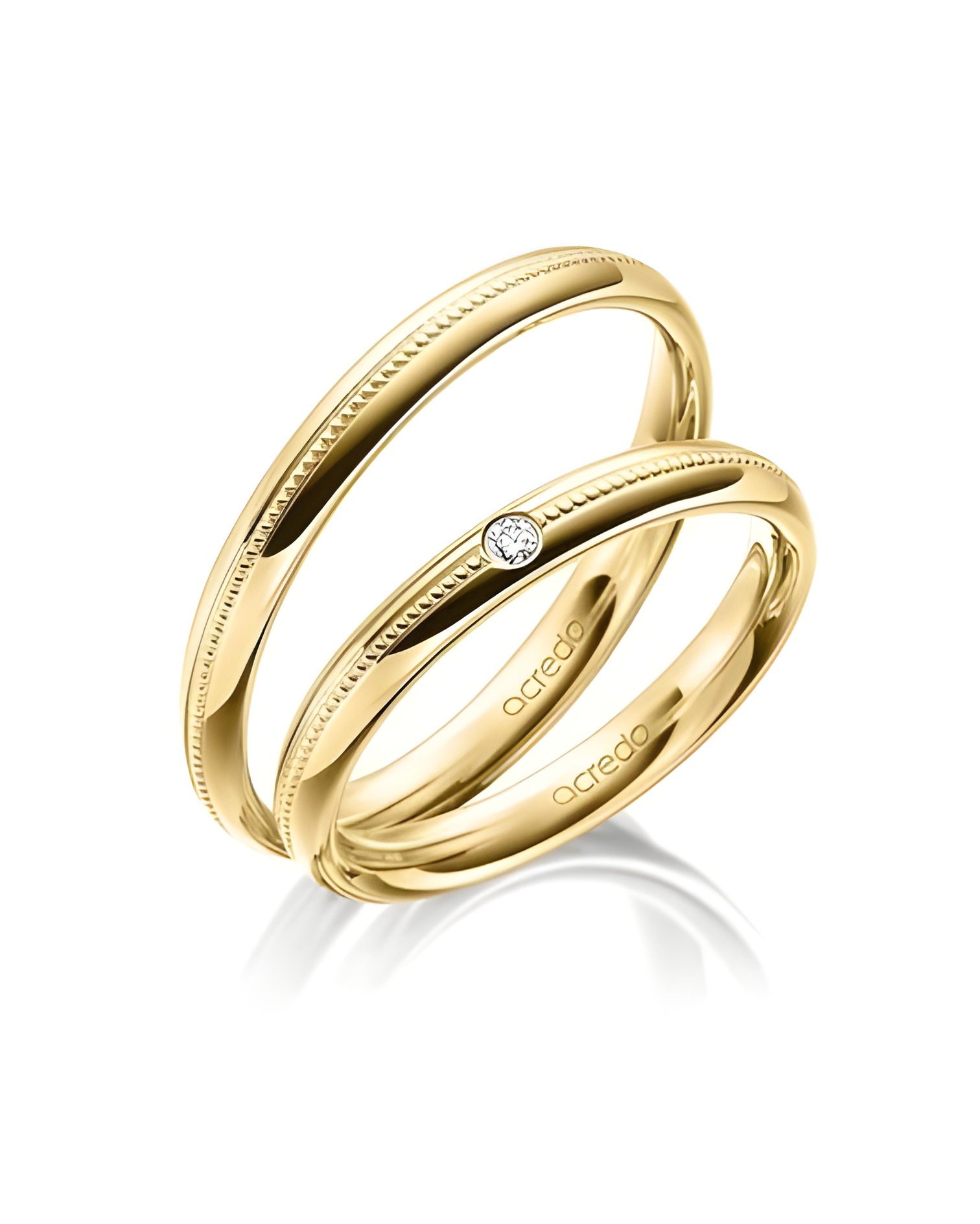 Finas alianzas de boda en oro amarillo con un diamante y acabado especial - Alianzas de boda - 




