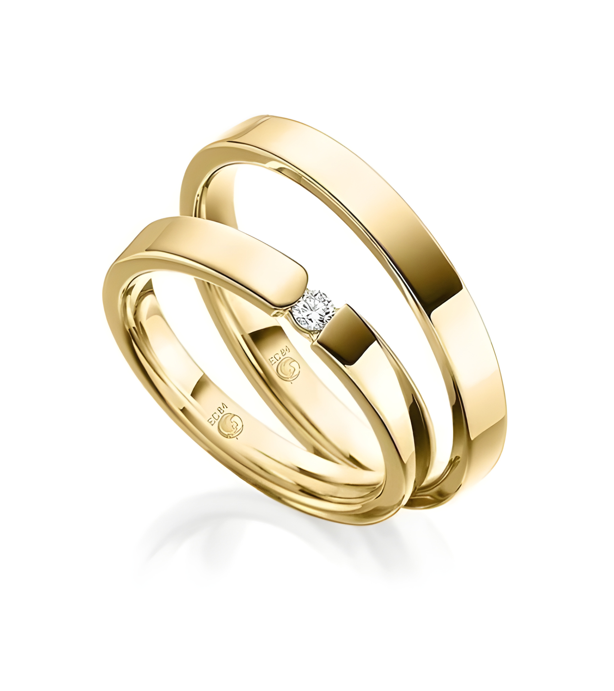 Pareja de anillos de boda de oro con un diamante al aire - Alianzas de boda - 



