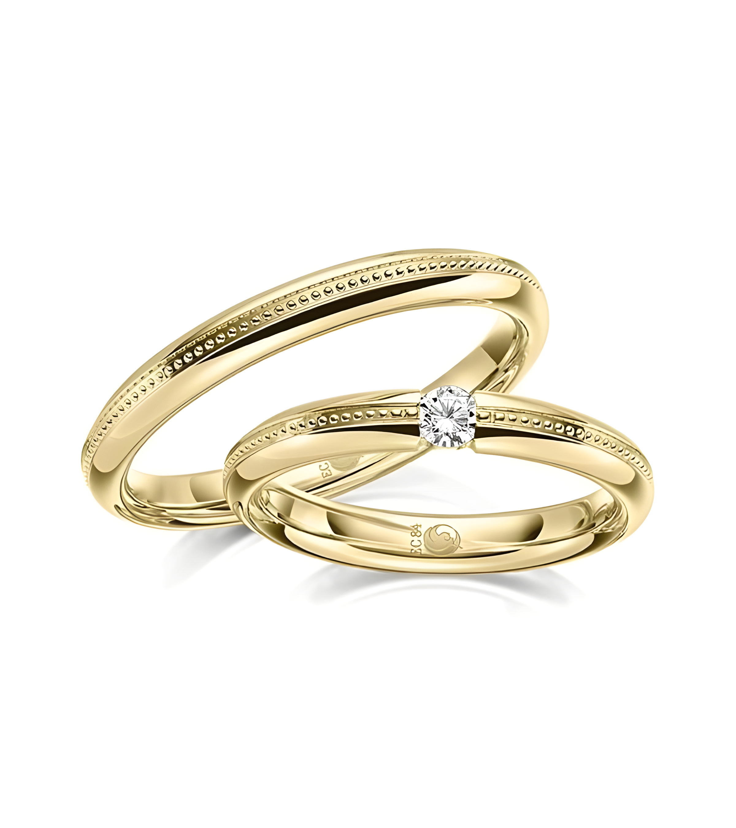 Pareja de alianzas de boda con diseño especial en oro con un diamante - Alianzas de boda - 


