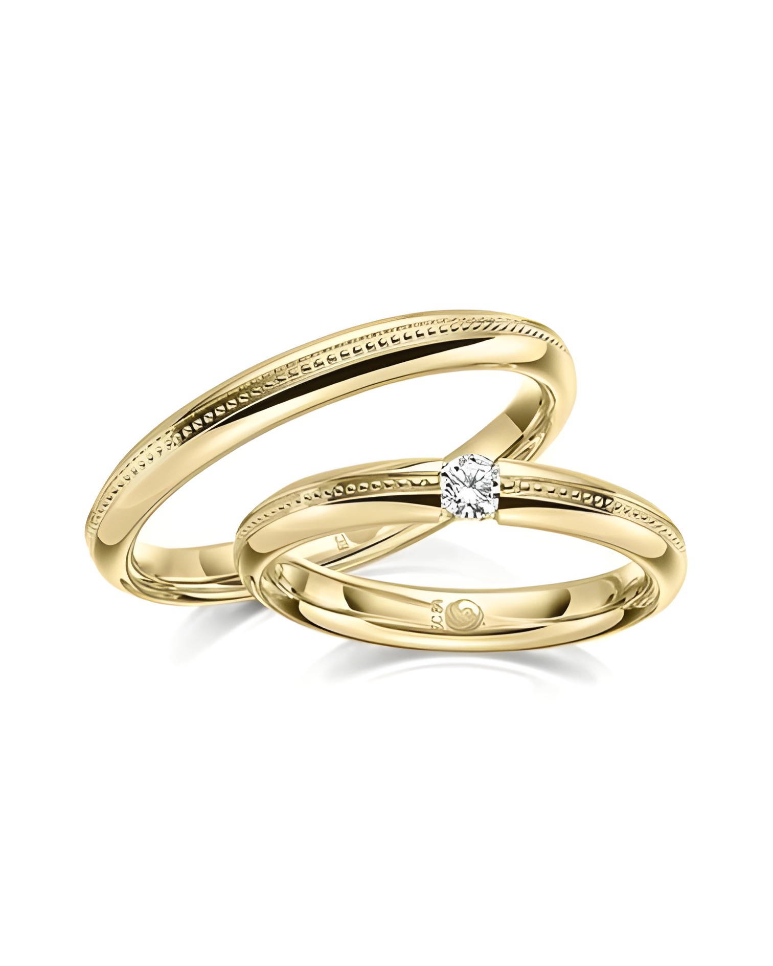 Pareja de alianzas de boda con diseño especial en oro con un diamante - Alianzas de boda - 


