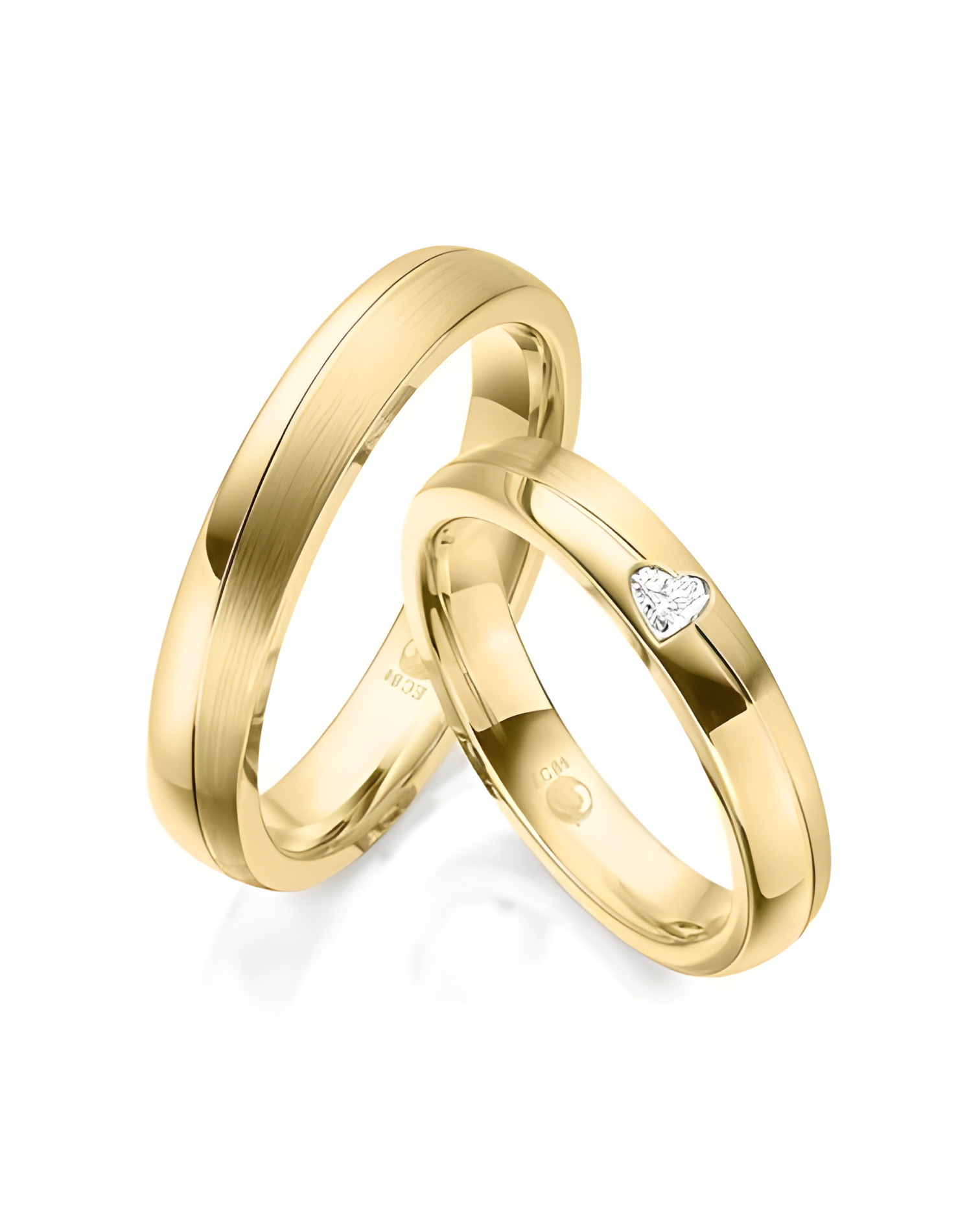 Alianzas de boda de oro con un diamante en forma de corazón - Alianzas de boda - 


