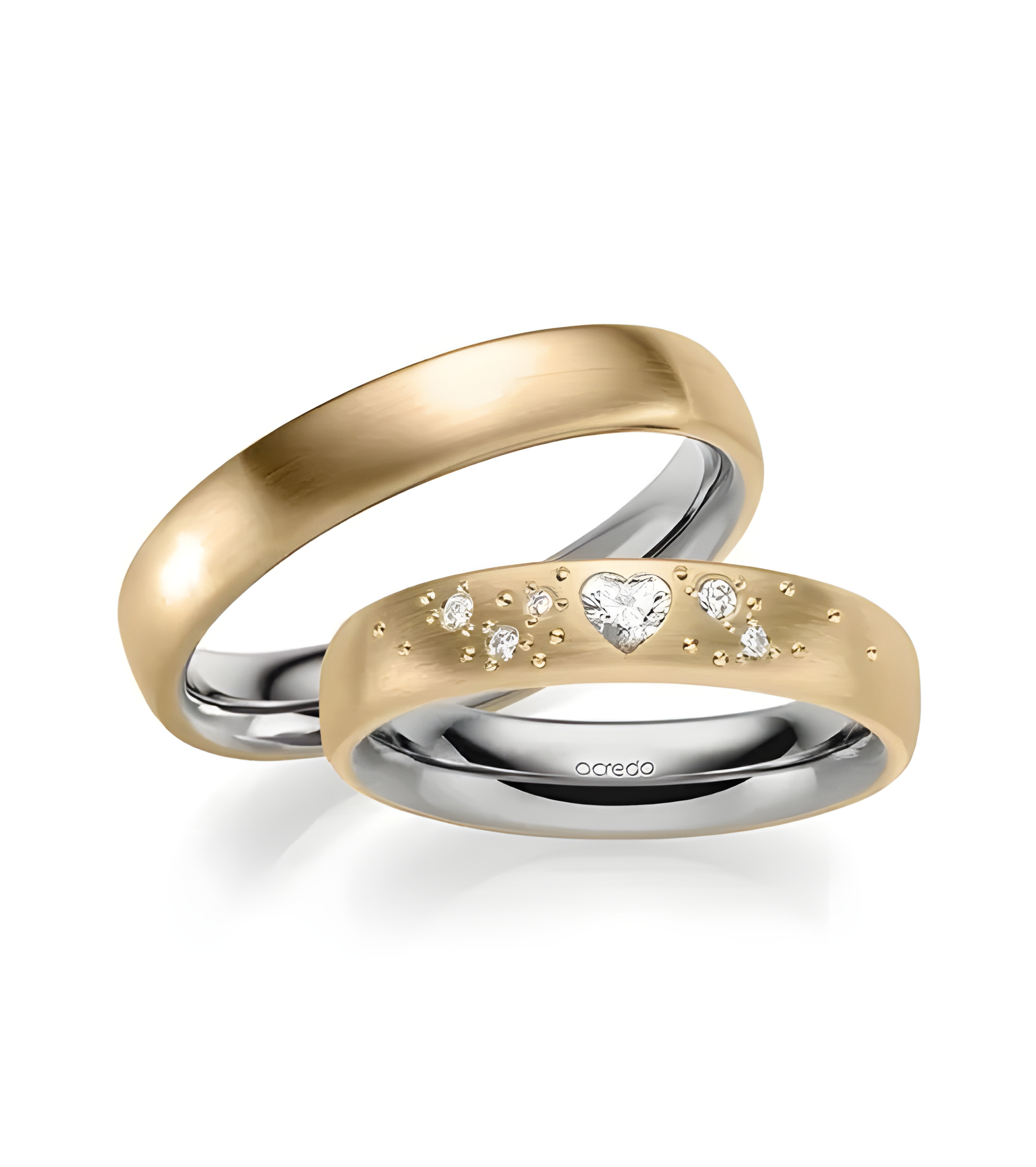 Originales anillos de boda en dos colores y diamante en forma de corazón. - Alianzas de boda - 


