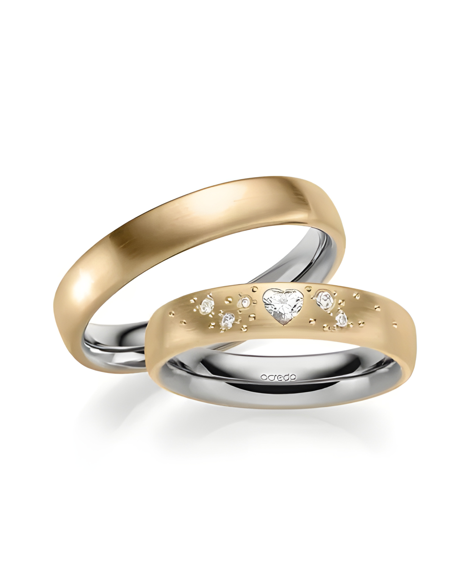 Originales anillos de boda en dos colores y diamante en forma de corazón. - Alianzas de boda - 


