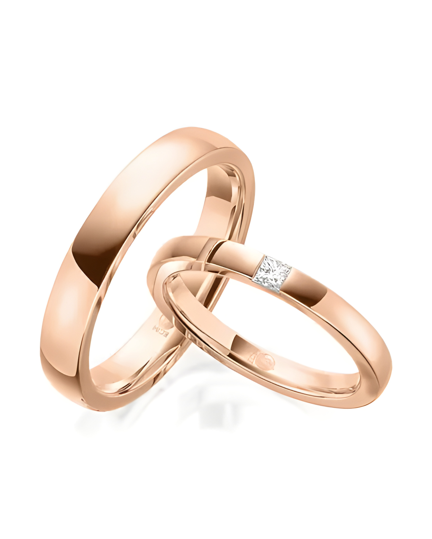 Alianzas de boda de oro con dos diamantes talla princesa