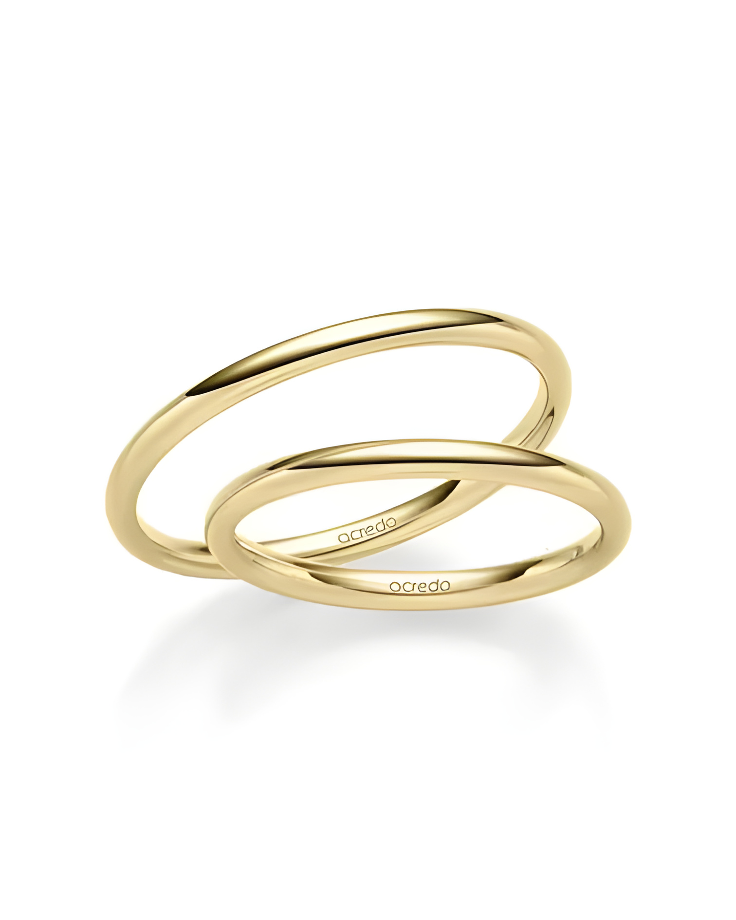 Alianzas de boda de oro con dos diamantes talla princesa