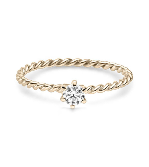 Exclusivos anillos en oro Signature, color achampanado | Staring